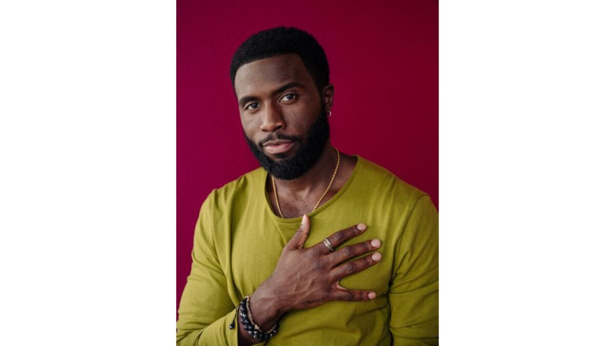 A Male Model With A Beard Posing For A Photo.