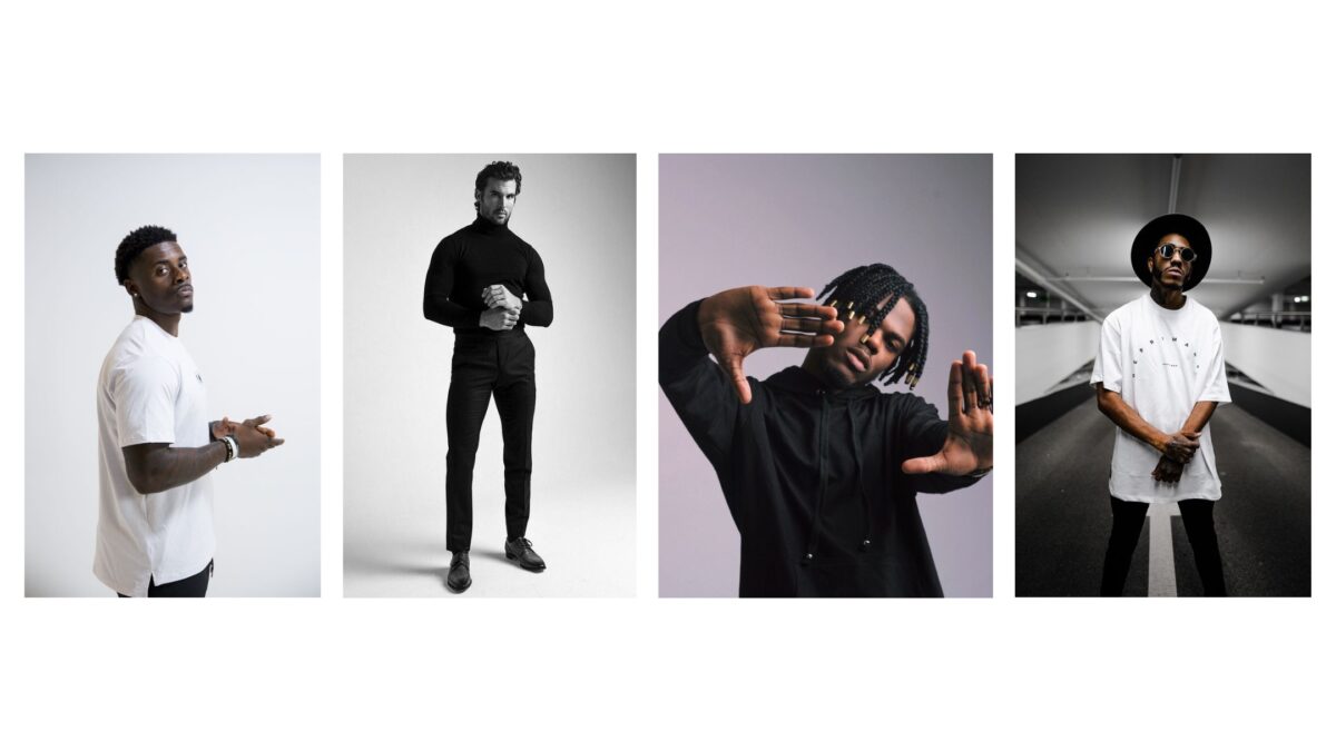 Four Male Models Posing For The Camera.