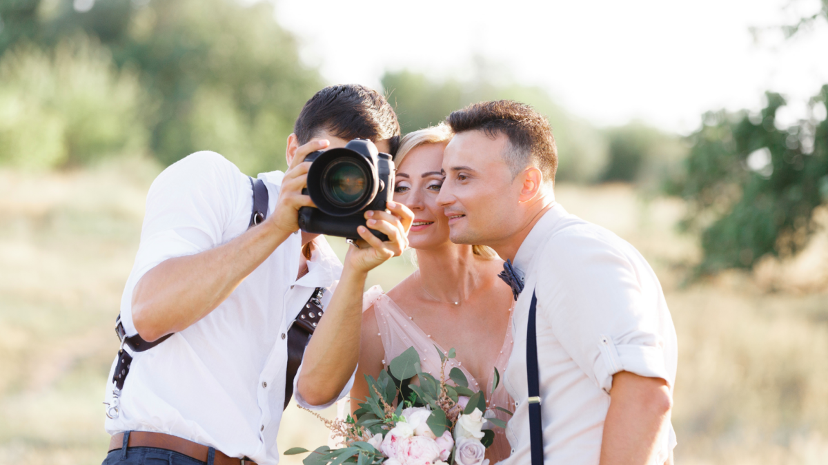 Wedding Photographer With Clients
